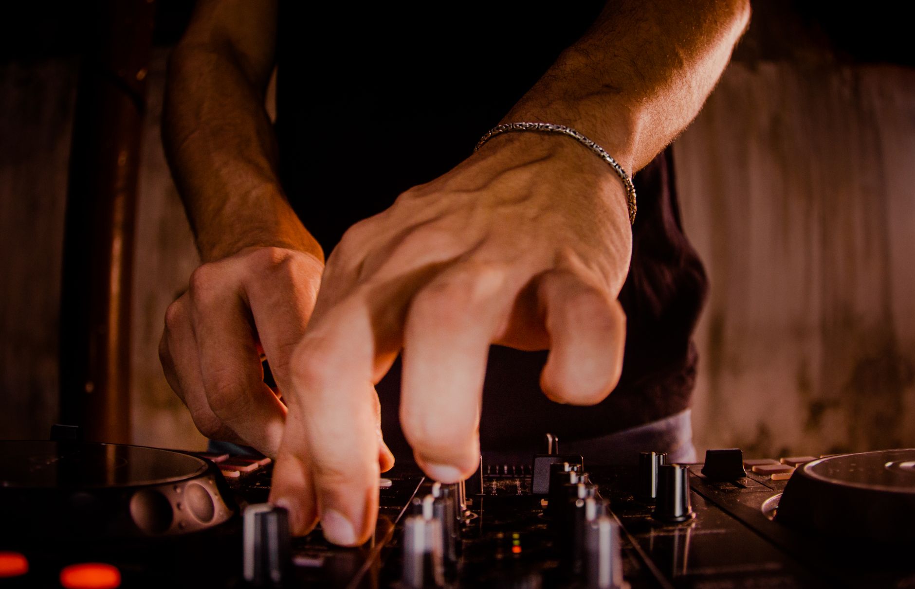 DJ mixing under lights